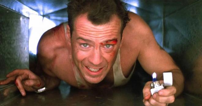 Bruce Willis como John McClane en Jungla de Cristal