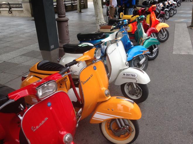 Vespas.