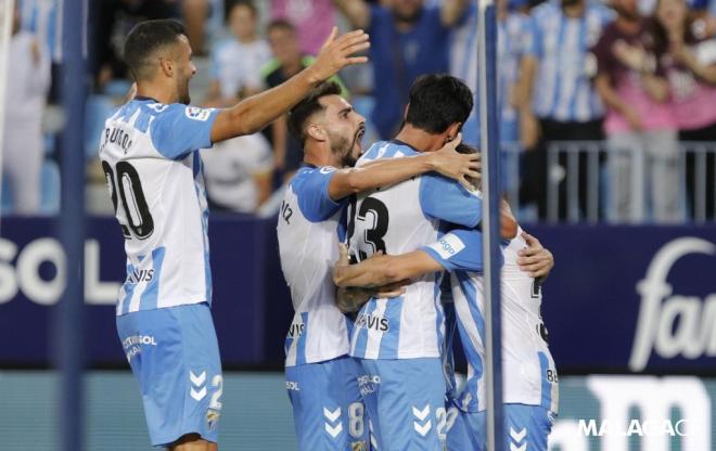 Los jugadores del Málaga celebran uno de los goles al Lugo (Foto: MCF).