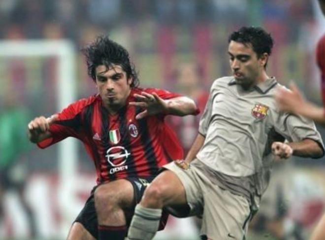 Gattuso y Xavi, en un partido entre el AC Milan y el FC Barcelona (Foto: EFE).