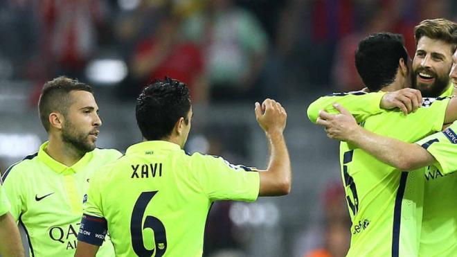 Alba, Xavi, Busquets y Piqué celebran en el Bayern - Barcelona de Champions en 2015. (Cordon Press)