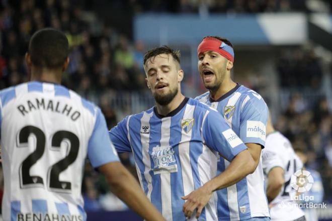 Genaro con Ramalho y Burgos en el Málaga-Racing (Foto: LaLiga).