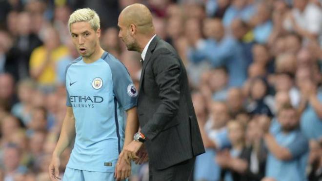 Nasri y Guardiola (Foto: Oli Scarff/AFP)