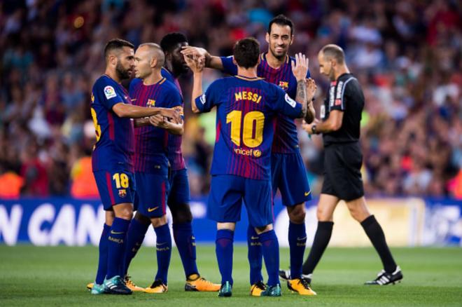 Jordi Alba, Andrés Iniesta, Leo Messi y Sergio Busquets, tras un triunfo del Barça.