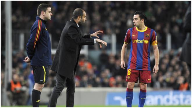 Pep Guardiola y Xavi Hernández, juntos en el Barcelona con el de Santpedor como técnico (foto: Co