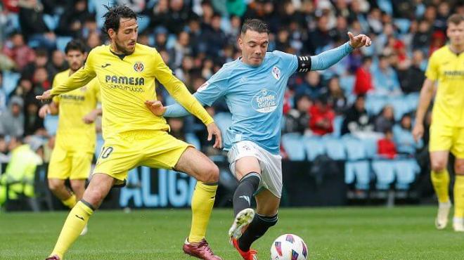 Iago Aspas ante Parejo (Foto: EFE).