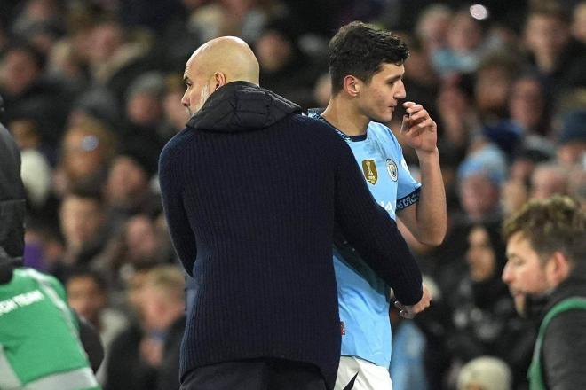 Khusanov con Pep Guardiola (Cordon Press)