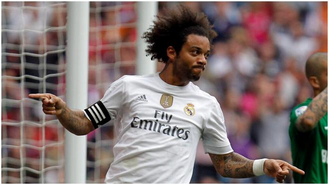 Marcelo celebrando un gol con el Real Madrid. (Foto: Cordon Press)