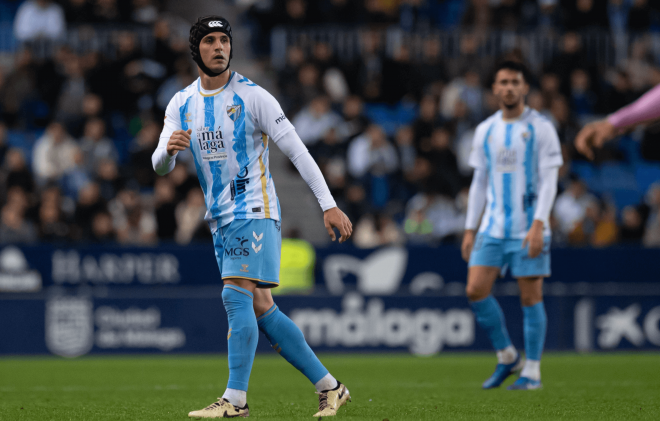 Luismi y, al fondo, Nelson Monte, en La Rosaleda. (Foto: MCF)