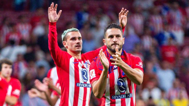 Antoine Griezmann y Koke Resurrección, tras un partido del Atlético (Cordon Press)