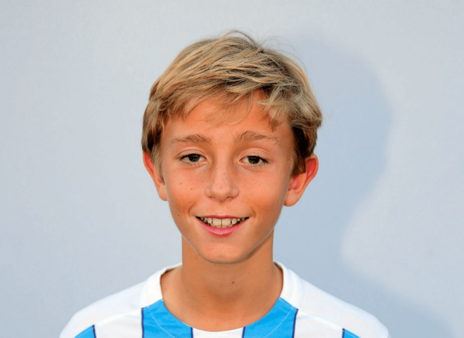 Dean Huijsen de niño vistiendo la elástica boquerona. (Foto: Málaga CF)