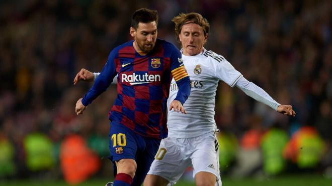 Leo Messi y Luka Modric, durante un Clásico (foto: Cordon Press).