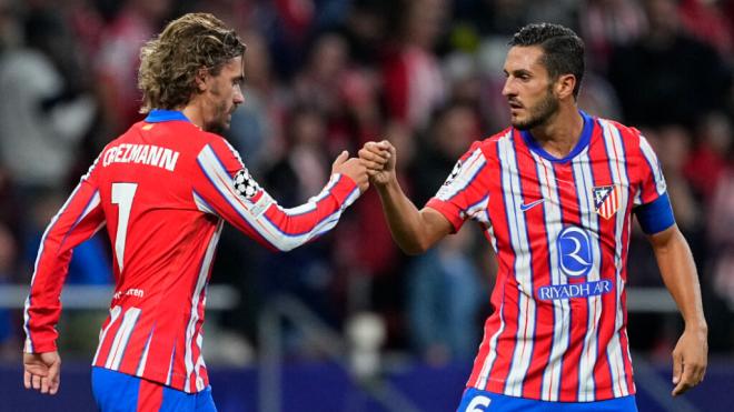 Griezmann y Koke celebran un gol en la Champions League (Europa Press)