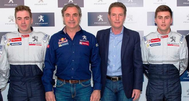 Cohete Suárez, en la izquierda, junto a Carlos Sainz.