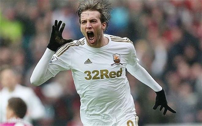 Michu celebra un gol durante su estancia en el Swansea.