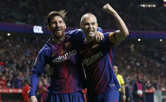 Messi e Iniesta celebran la consecución del título
