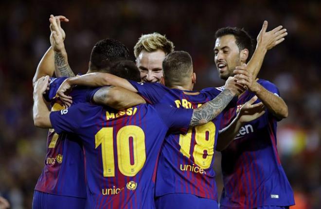 Los jugadores del Barça celebran uno de los goles.