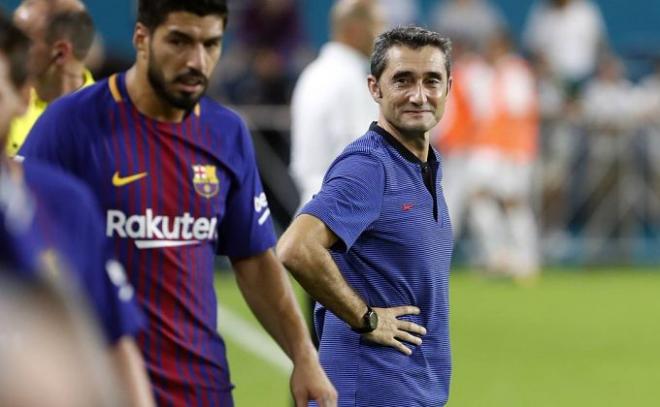 Valverde y Suárez durante un encuentro.