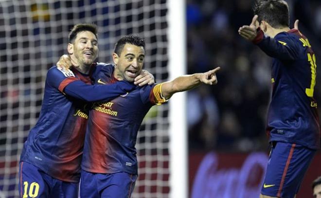Xavi y Messi celebran un gol con el Barça.