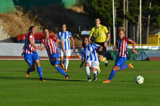 Lance de un partido entre el Atleti y el Sporting | Clara Verdier