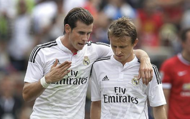 Modric, en un partido junto a Bale.