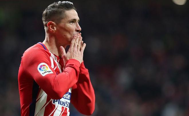 Torres celebra un gol con el Atlético.