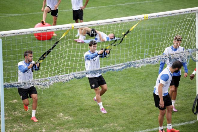 Los jugadores, entrenándose.