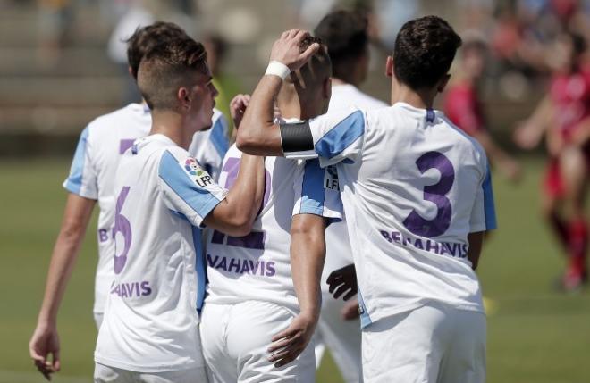 Los jugadores del malagueño, celebrando un gol.