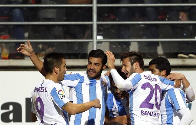 Los jugadores del Málaga, celebrando un gol.