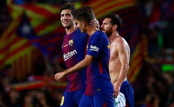 Sergi Roberto, Denis y Messi, jugadores del Barcelona.