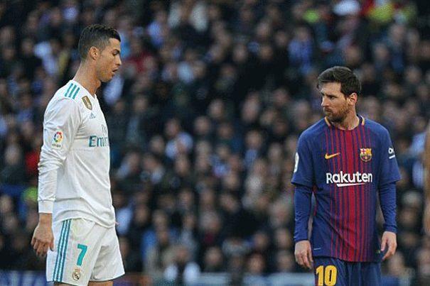 Cristiano y Messi durante el último Clásico.
