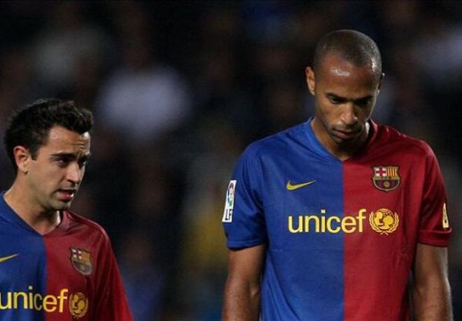 Henry junto a Xavi en su etapa como blaugrana.