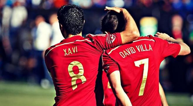 Xavi y Villa, compañeros en el Barça y la selección.
