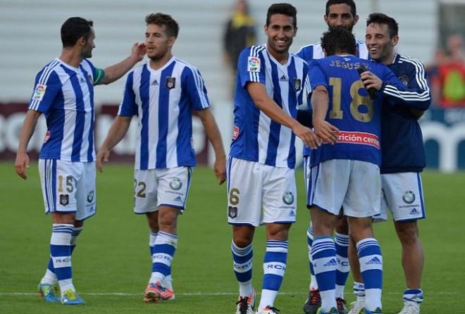 Jugadores del Recre celebran un gol.