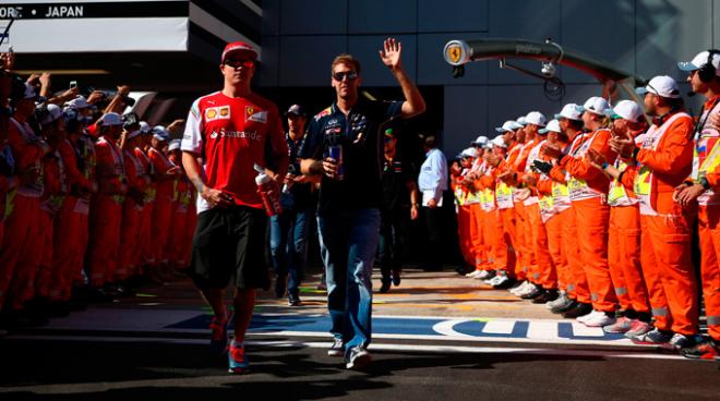 Kimi y Vettel, en un Gran Premio reciente