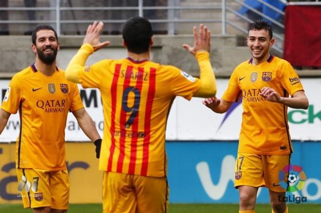 Suárez, Munir y Arda celebran un gol ante el Eibar.