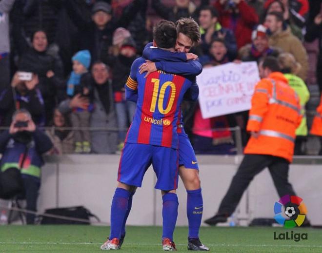 Messi y Denis Suárez celebran un gol ante la Real.