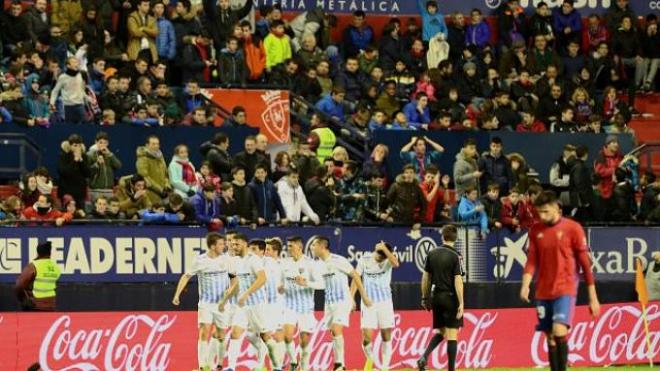 Los jugadores del Málaga celebran el tanto del empate.