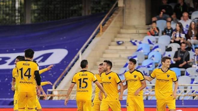 Los andaluces se abrazan tras el gol de Luis Hernández.