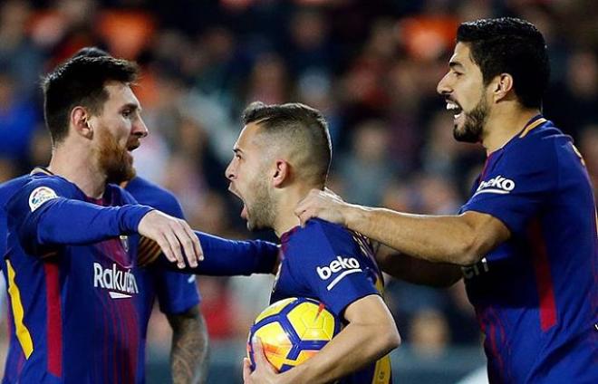 Alba, Messi y Suárez, celebrando uno de los goles al Celta.