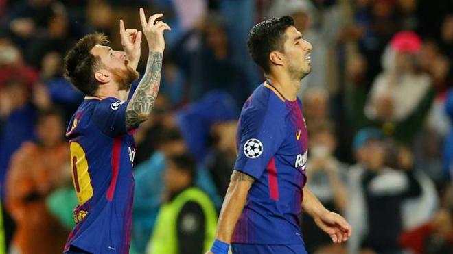 Messi y Suárez celebrando un gol frente al Olympiacos