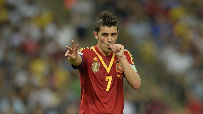 David Villa celebra un gol con España.