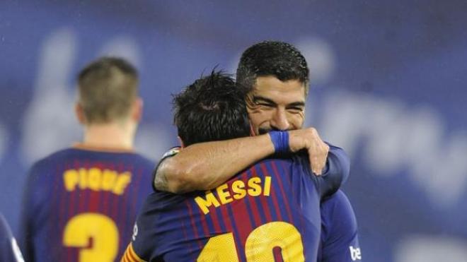 Messi y Suárez celebran la victoria.