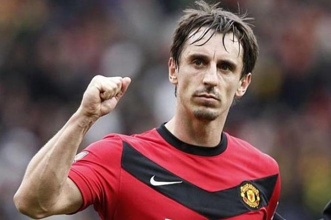 Neville, en un partido con el Manchester United.