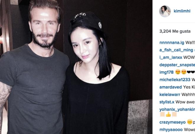 Kim Lim, hija del dueño del Valencia, posa junto a el ex jugador David Beckham.