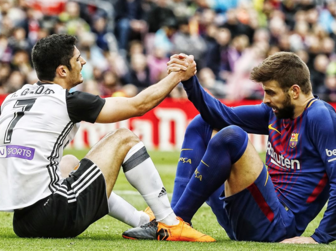 Guedes y Piqué (Foto: Valencia CF).