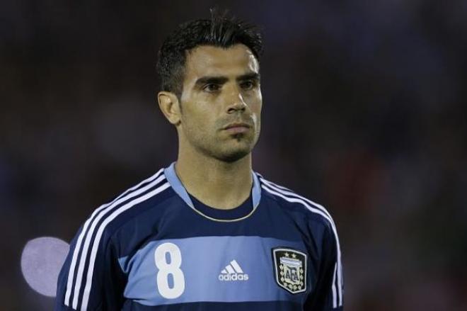 Augusto en un partido con Argentina